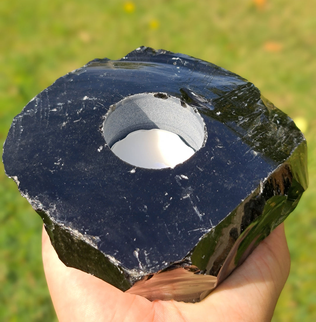 magiska juodo obsidino zvakide